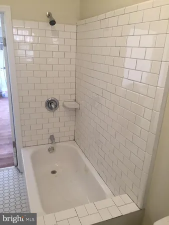 a bathroom with a bathtub