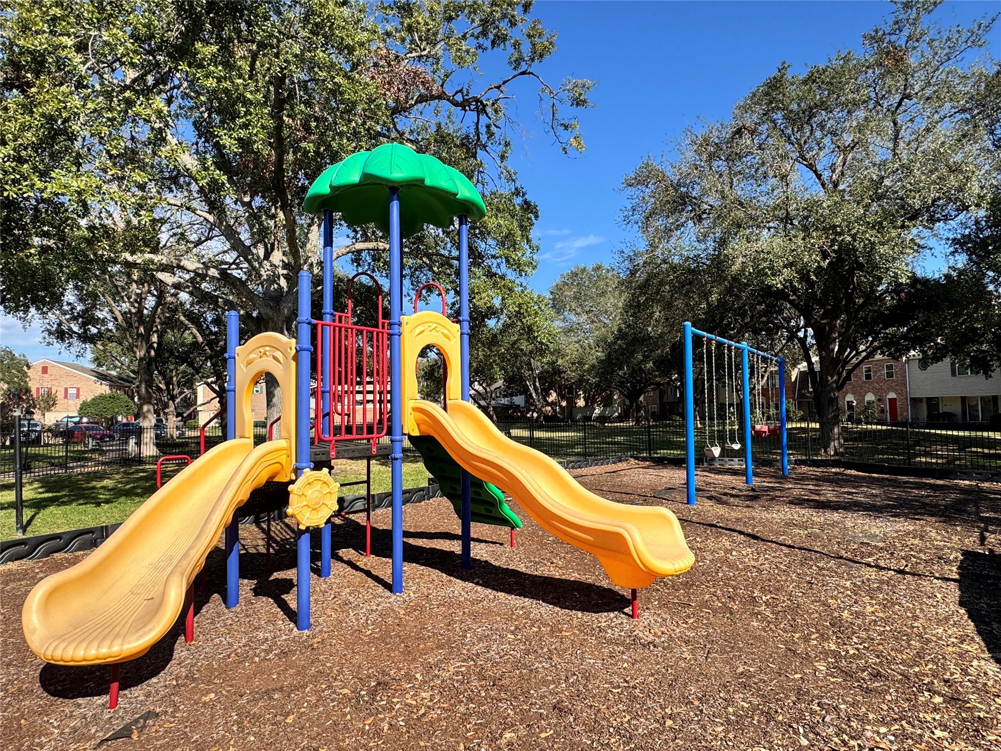 2041 Winrock Boulevard, Unit 157 Houston, TX 77057 - Photo 22 of 25 Beautiful community park with playground equipment located next to the pool ideal for getting the kids tired for early sleep time!