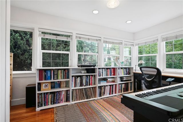 a room with furniture and a book shelf