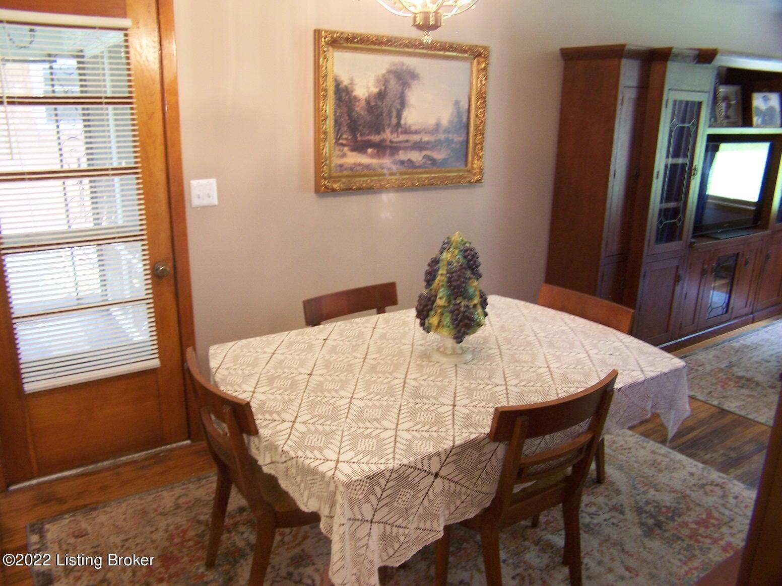 1627 Whippoorwill Road Louisville, KY 40213 - Photo 14 of 29 Dining Room with hardwood flooring, access to the screened in porch and access to the Eat-in Kitchen and Living Room.
