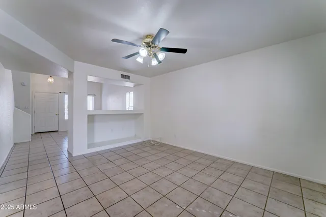 a view of an empty room and window