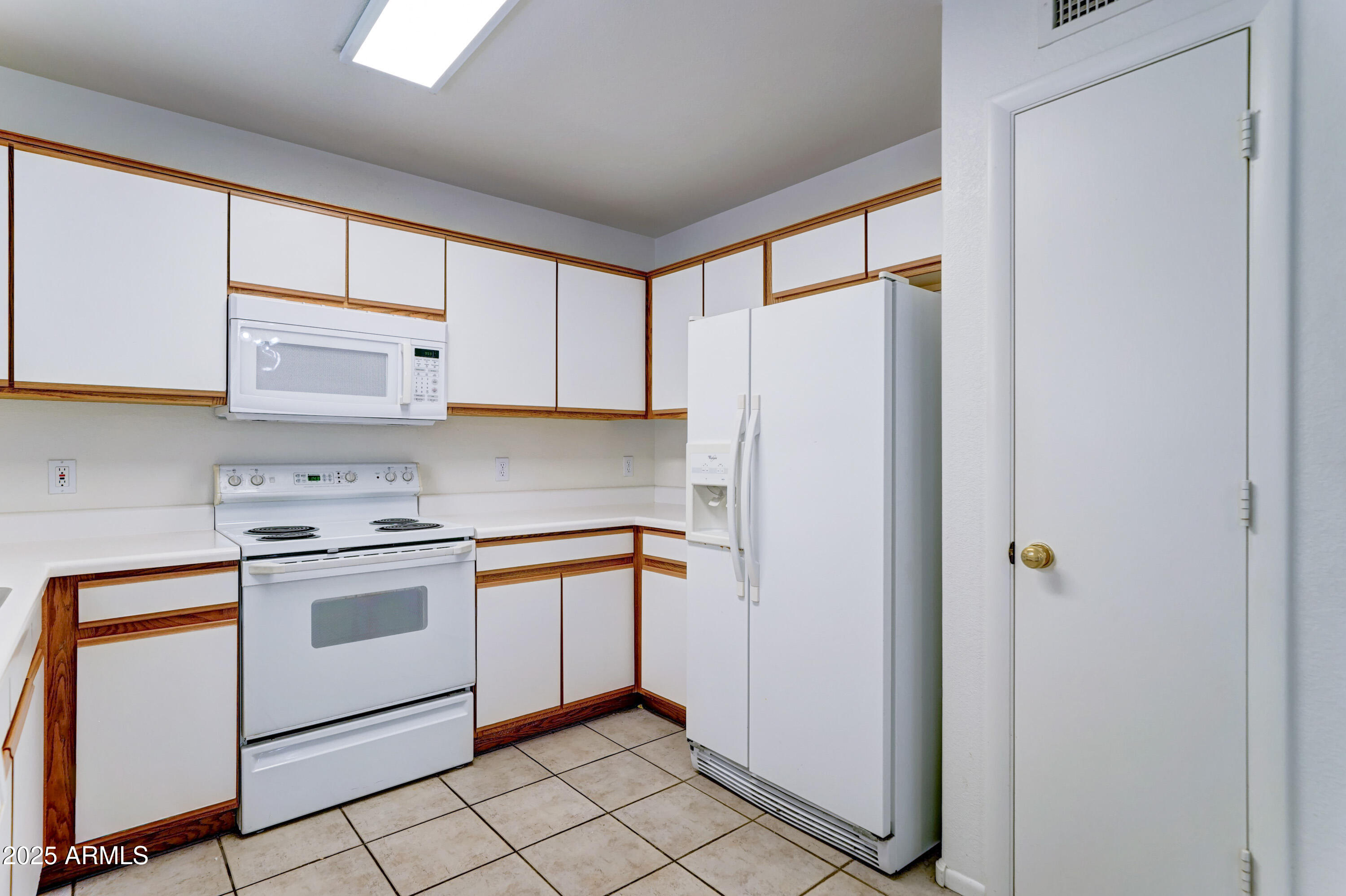 Undisclosed Address Phoenix, AZ 85024 - Photo 13 of 32 a kitchen with stainless steel appliances granite countertop a refrigerator and a stove
