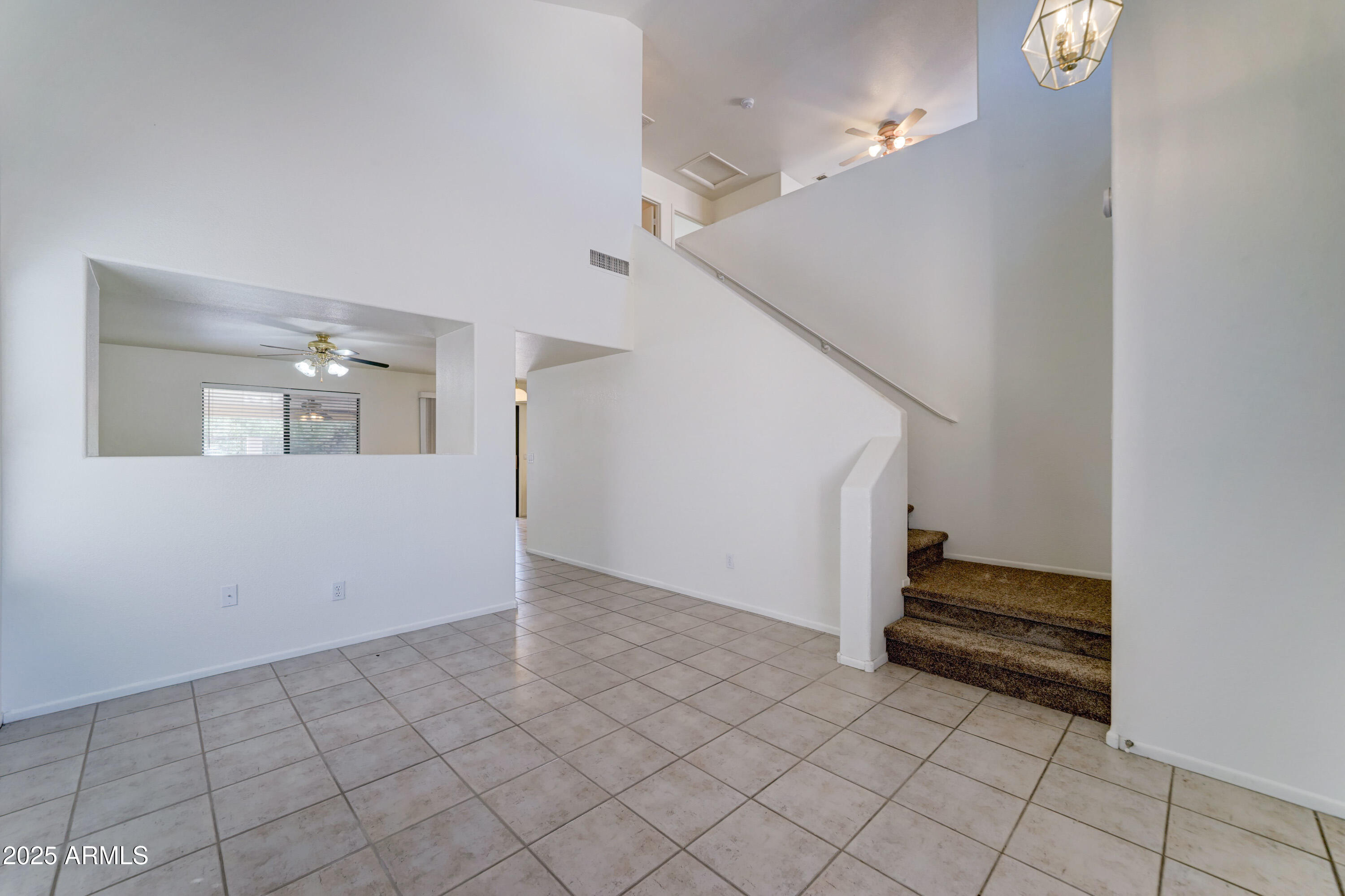 Undisclosed Address Phoenix, AZ 85024 - Photo 6 of 32 a view of entryway and hall with a window