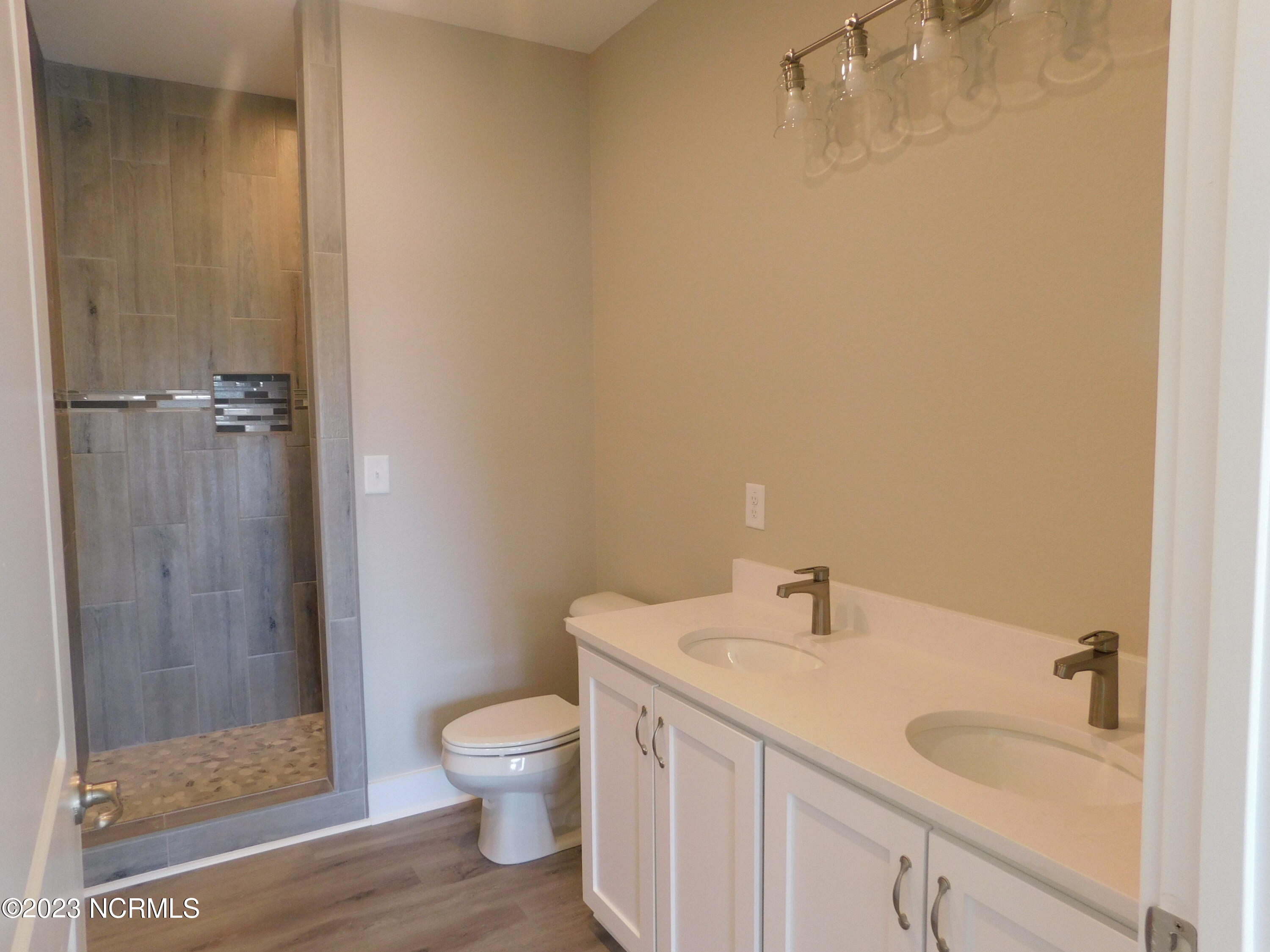 14 Mallory Buck Road Gates, NC 27937 - Photo 8 of 13 Primary Bath-Dual Sinks-Tile Shower
