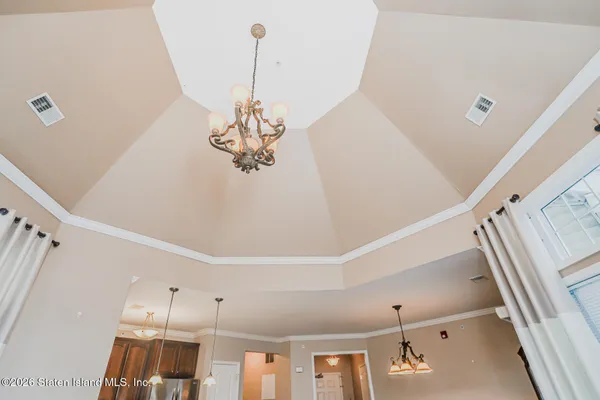 a very nice looking room with a ceiling fan