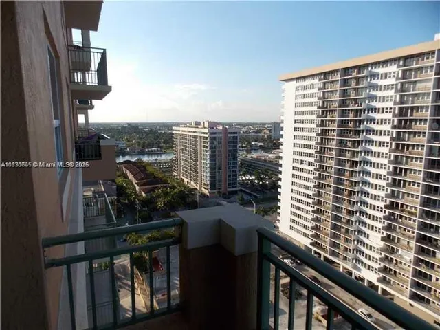 a view of a balcony with an outdoor space