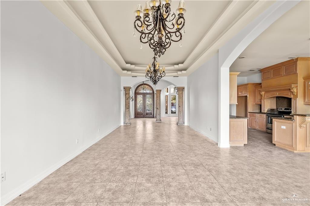 2913 San Rodrigo Mission, TX 78572 - Photo 6 of 29 a view of a hallway with a chandelier
