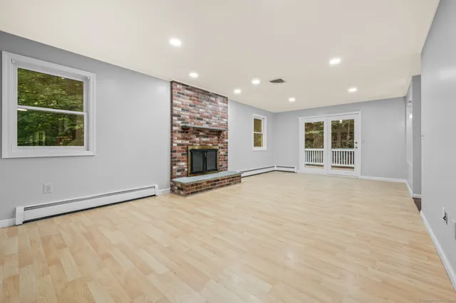 a view of an empty room with a window