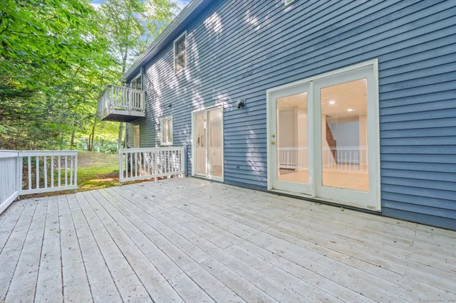 a view of a house with a deck
