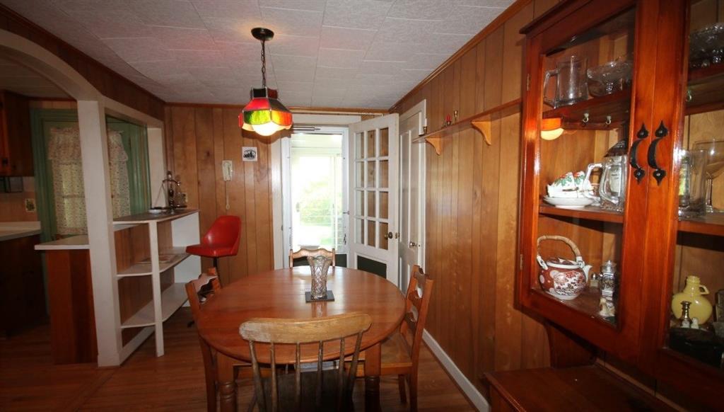 350 Ocean Point Road East Boothbay, ME 04544 - Photo 13 of 22 The dining room with wood built-in...