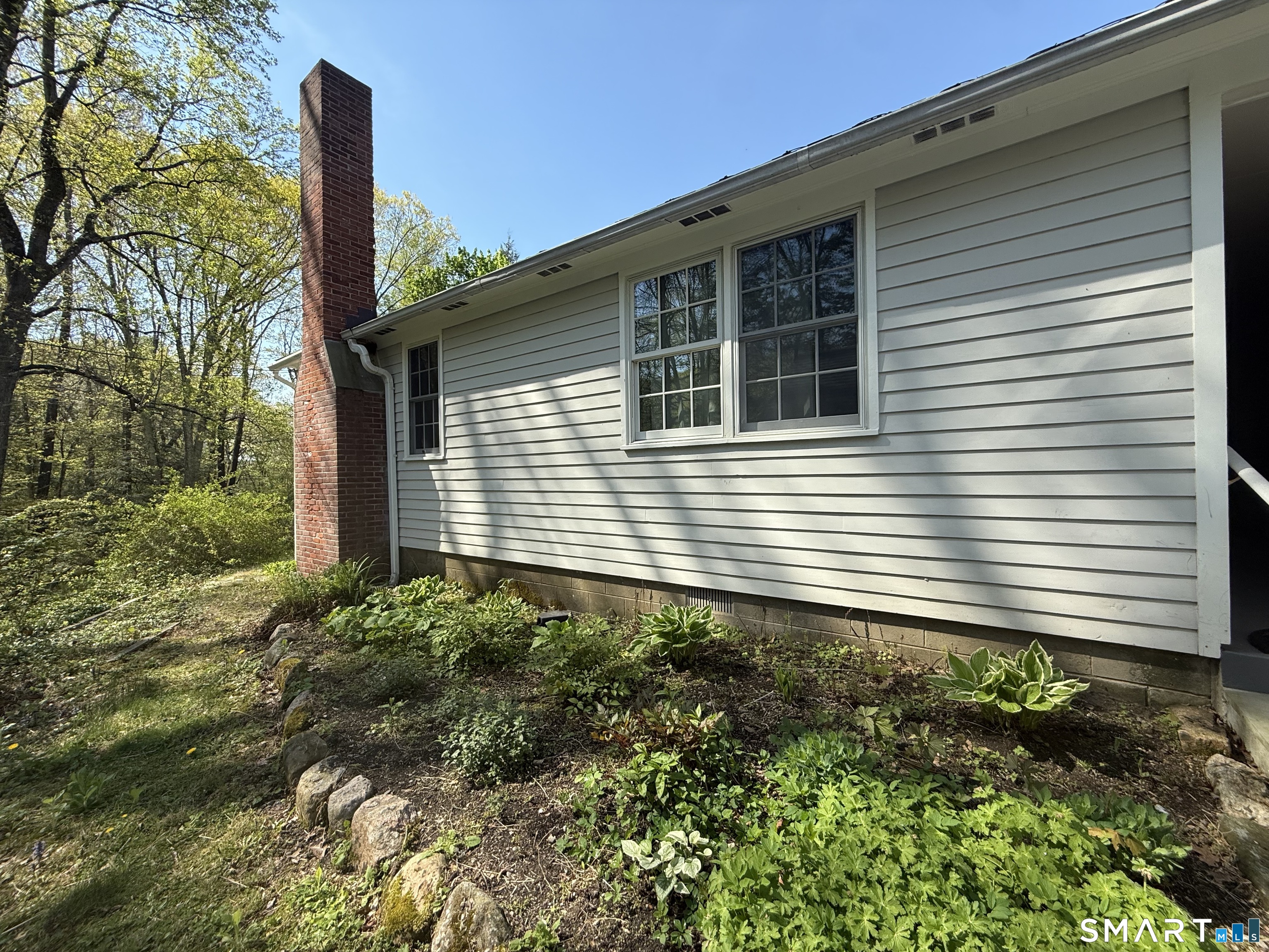 West Mountain Road Ridgefield, CT 06877 - Photo 14 of 17 a side view of a house with a yard