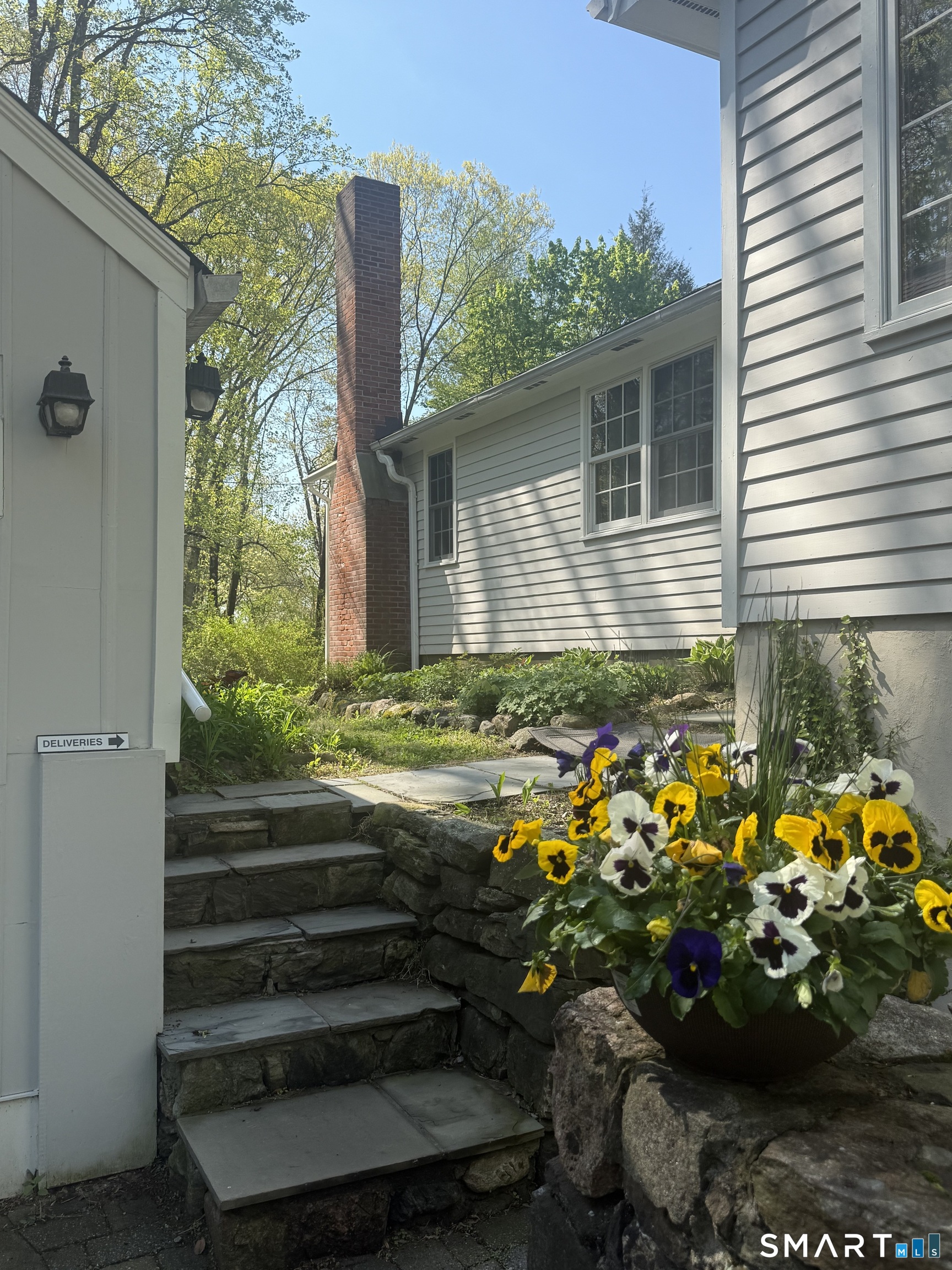 West Mountain Road Ridgefield, CT 06877 - Photo 15 of 17 a front view of a house with a yard