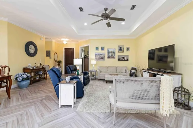 a bathroom with a granite countertop sink a mirror and a shower