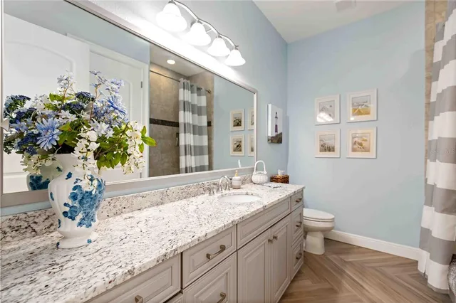 a view of a house with swimming pool and a garden