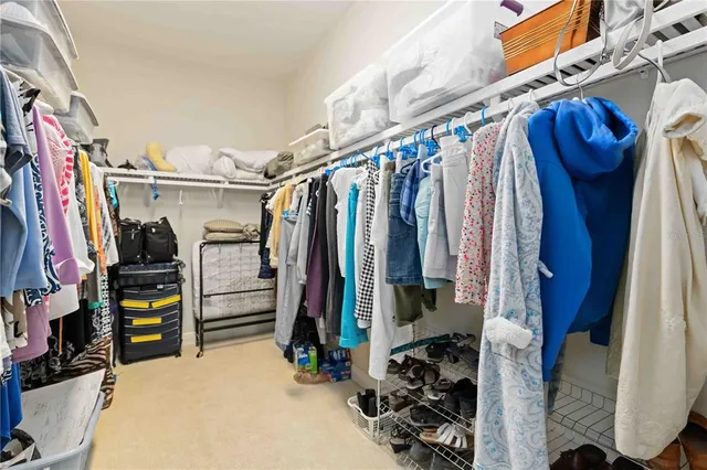 an aerial view of residential houses with yard