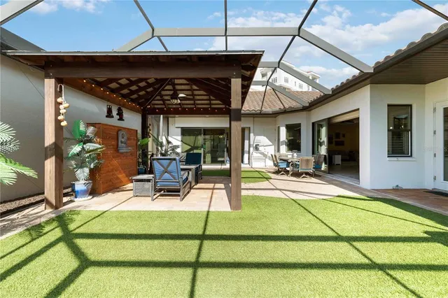 an aerial view of residential houses with city view