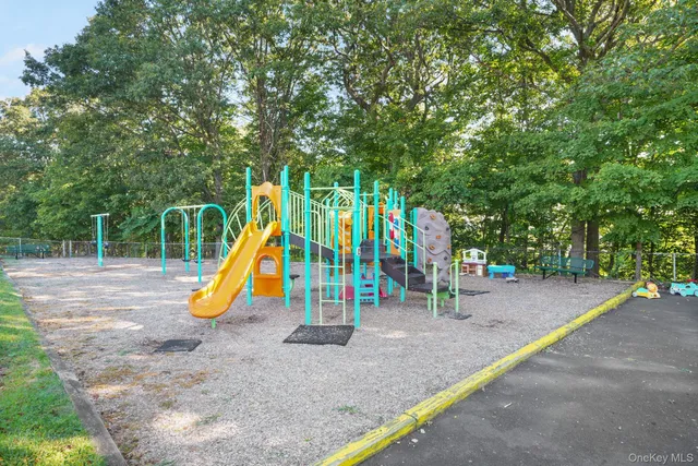 a view of a park with a slide