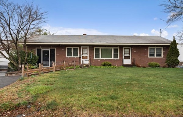 189 Brook Street Clinton, MA 01510 - Photo 1 of 29 front view of a house with a yard