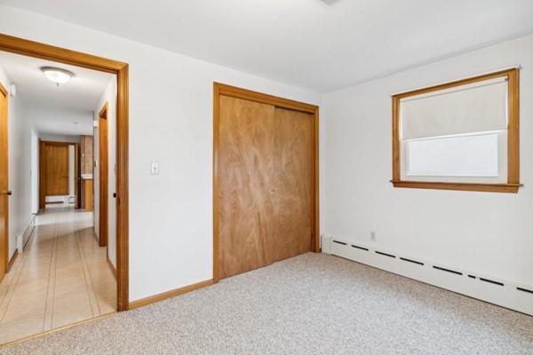 189 Brook Street Clinton, MA 01510 - Photo 14 of 29 a view of an empty room with window