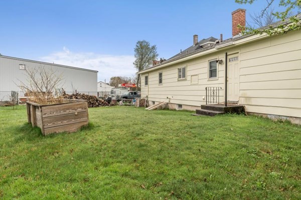 189 Brook Street Clinton, MA 01510 - Photo 29 of 29 a view of a house with a backyard