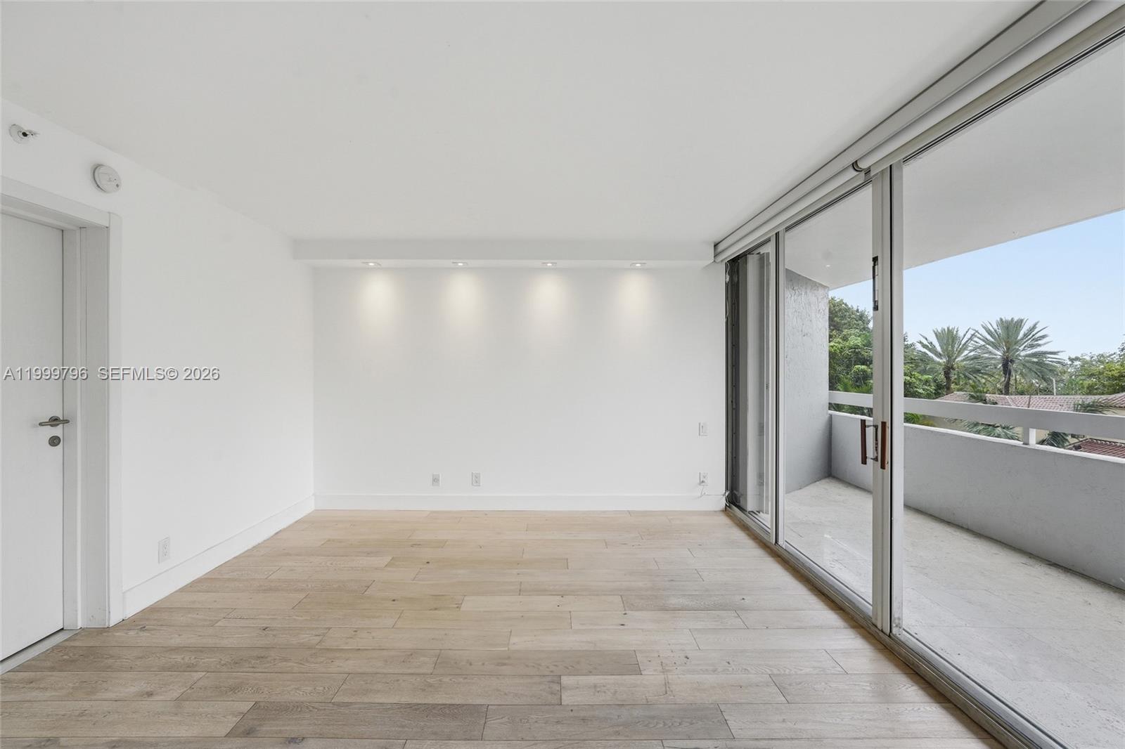 1627 Brickell Avenue, Unit 603 Miami, FL 33129 - Photo 18 of 29 a view of an empty room and window