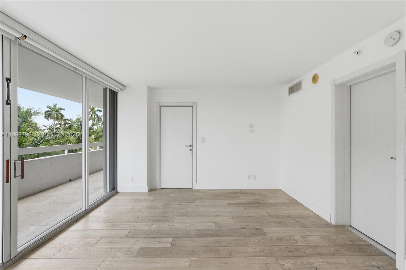 1627 Brickell Avenue, Unit 603 Miami, FL 33129 - Photo 22 of 29 a view of an empty room with a window
