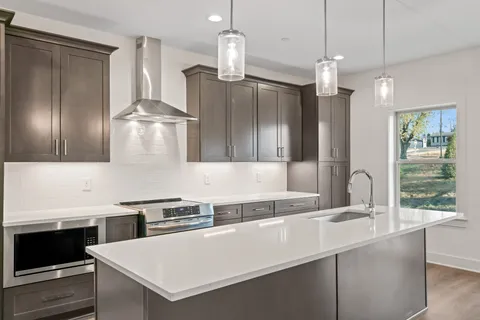 a view of a livingroom with furniture and wooden floor