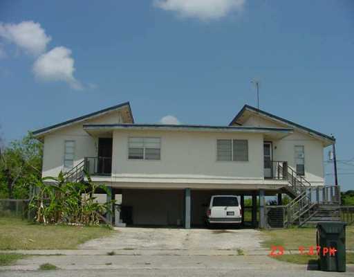 0 Easy Circle, Unit B Corpus Christi, TX 78418 - Photo 1 of 3 a front view of a house with a yard
