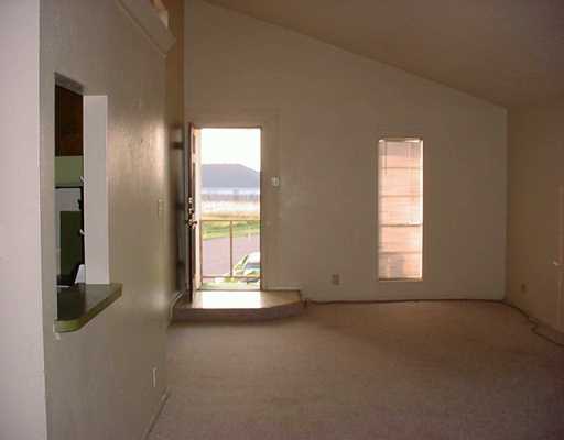 0 Easy Circle, Unit B Corpus Christi, TX 78418 - Photo 2 of 3 an empty room with windows