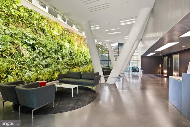 a outdoor living space with furniture and a potted plant
