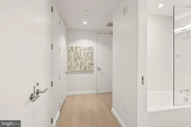 a view of a hallway with closet