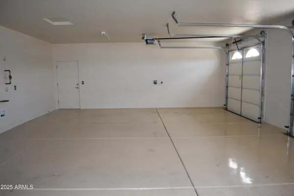 a bathroom with a toilet and a tub