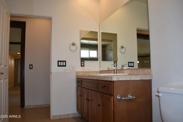 a view of a room that has a window in it