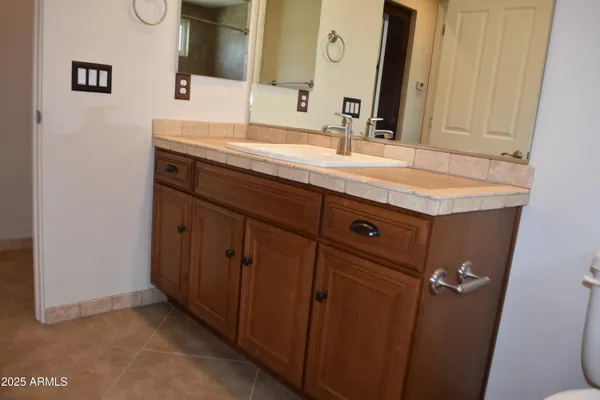 a view of empty room with windows