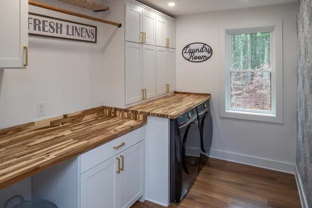 a view of a storage and utility room with closet