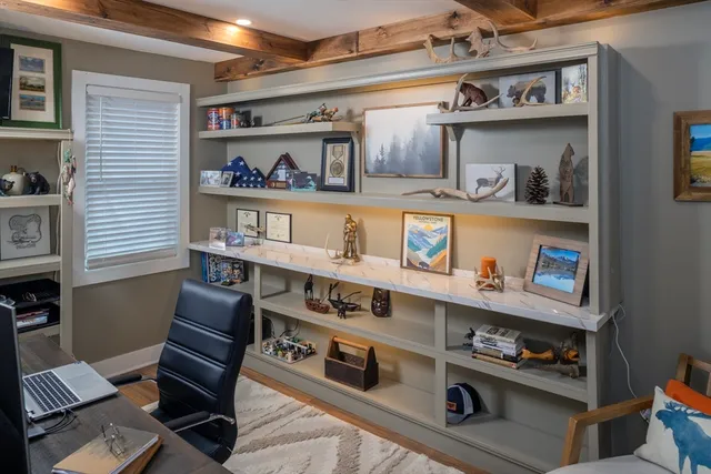 a view of a balcony with chairs