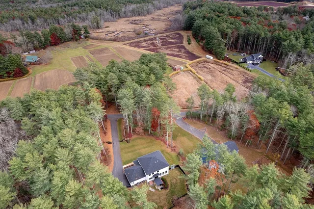 an aerial view of residential house with outdoor space