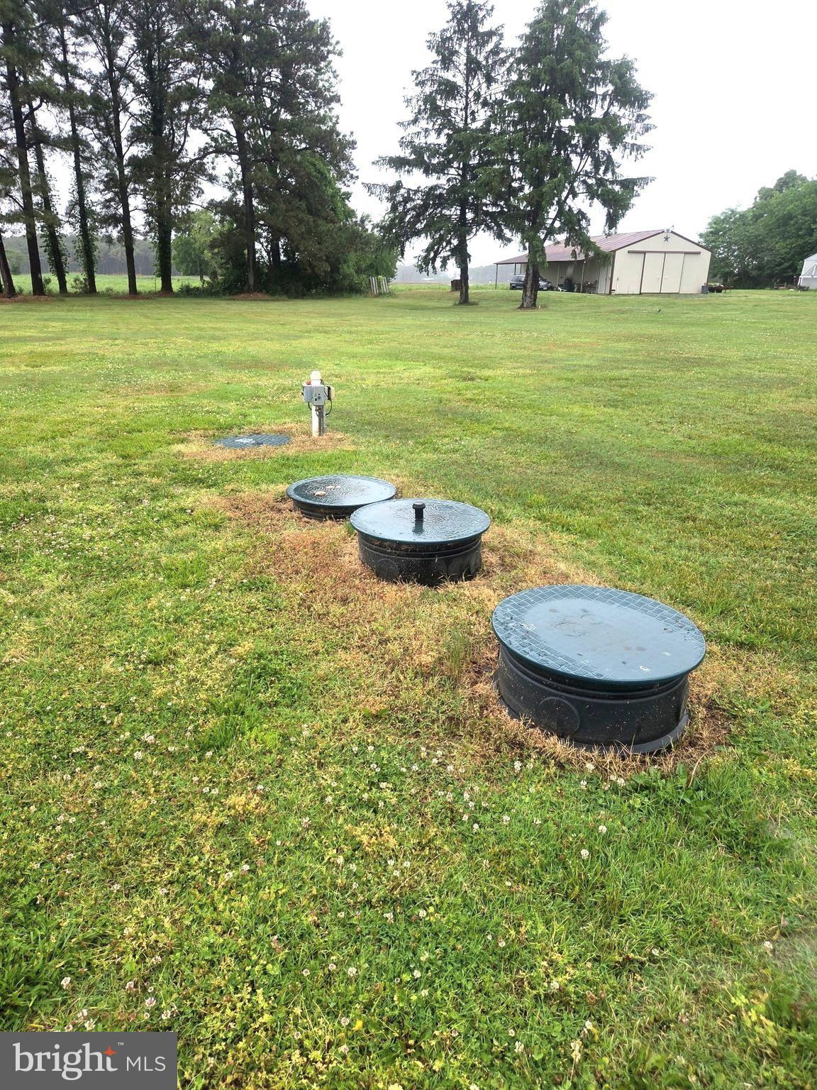 2820 Hoopers Island Road Church Creek, MD 21622 - Photo 2 of 9 a view of a swimming pool with a garden