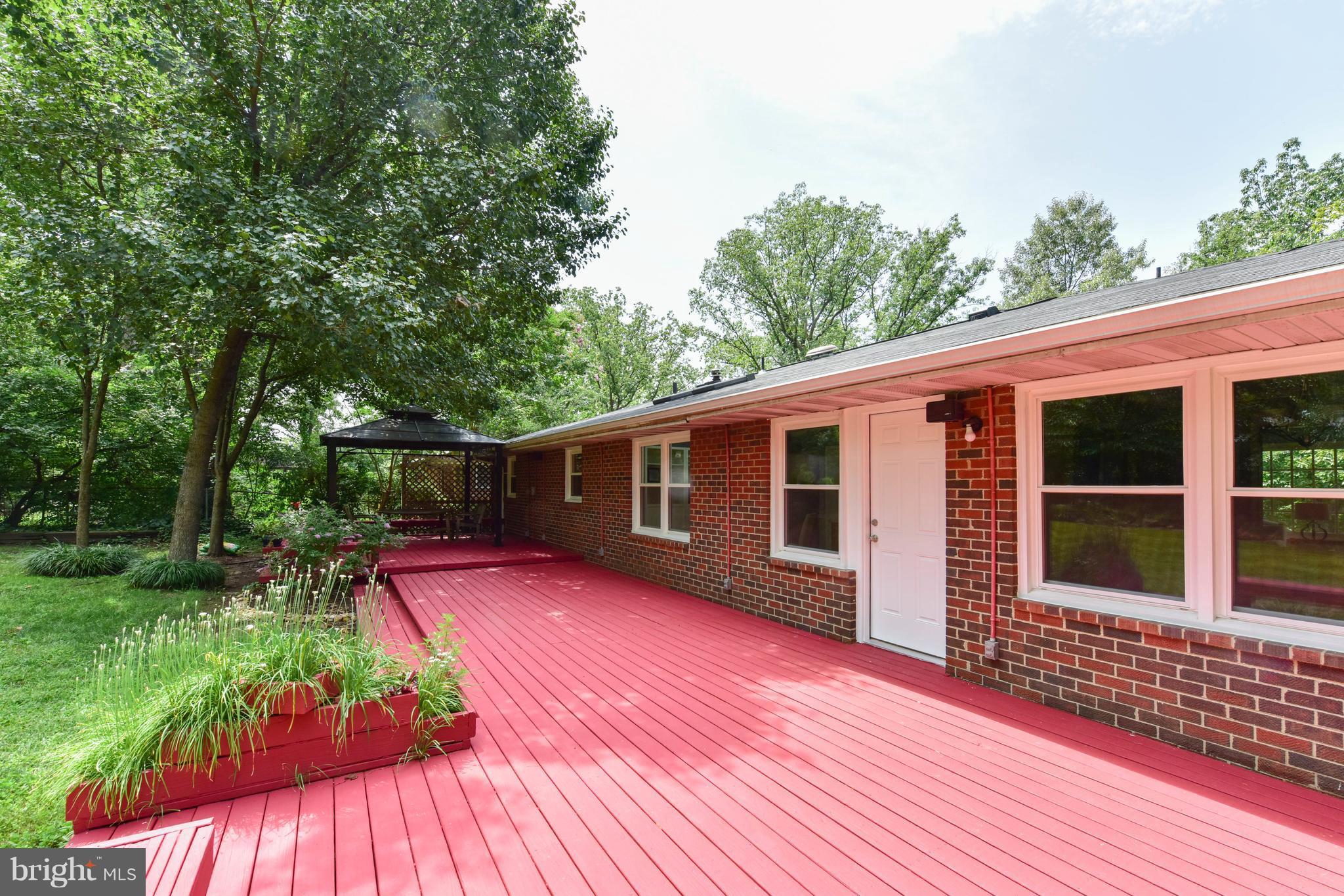 7201 Fort Hunt Road Alexandria, VA 22307 - Photo 23 of 30 a view of a house with a backyard