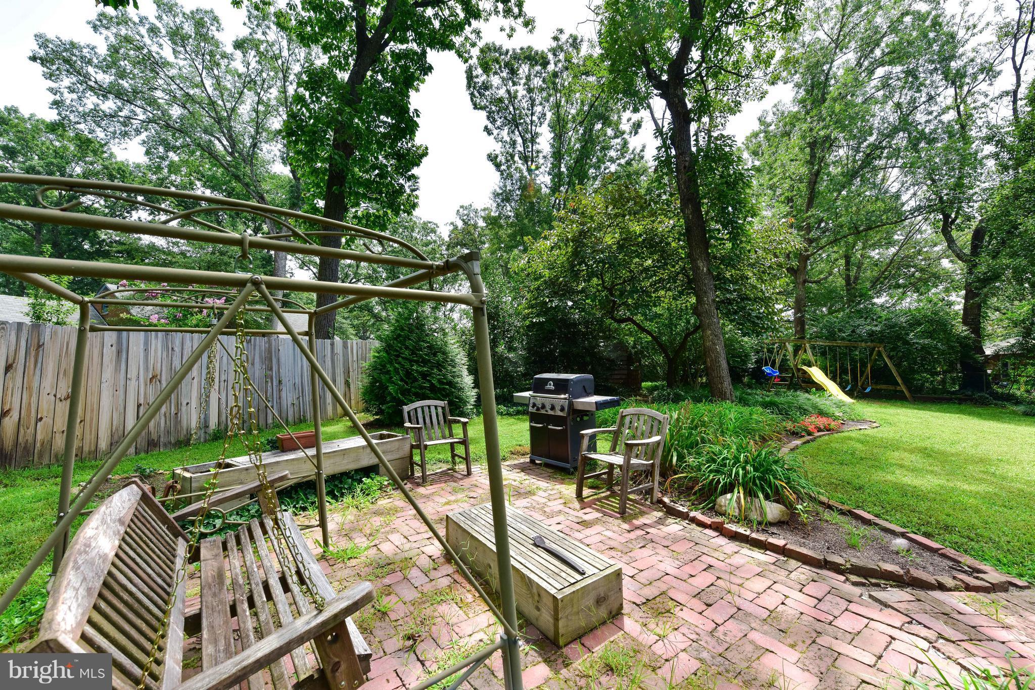 7201 Fort Hunt Road Alexandria, VA 22307 - Photo 25 of 30 a view of backyard with furniture and outdoor seating