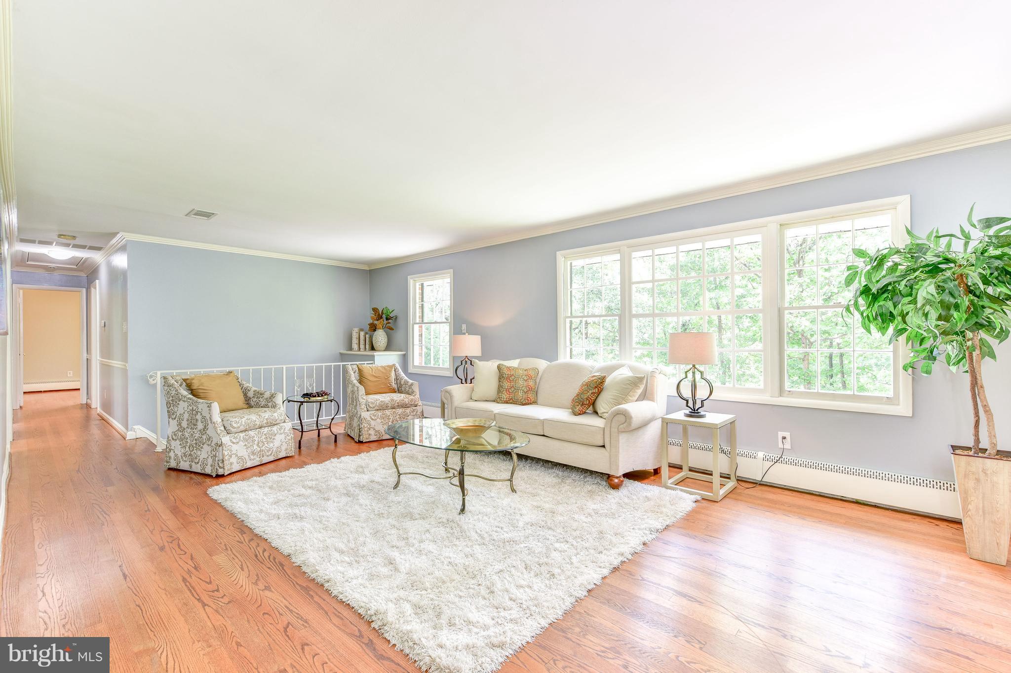 7201 Fort Hunt Road Alexandria, VA 22307 - Photo 6 of 30 a living room with furniture and a large window