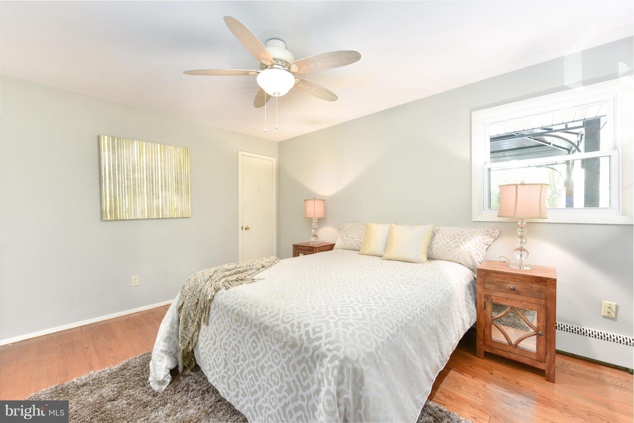 7201 Fort Hunt Road Alexandria, VA 22307 - Photo 10 of 30 a bedroom with a bed and a window
