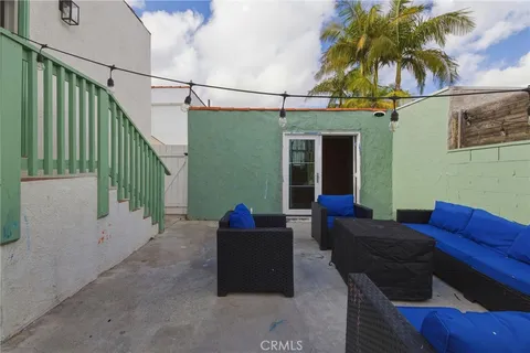 a outdoor living space with furniture and city view