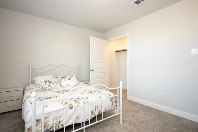 a view of a workspace with furniture