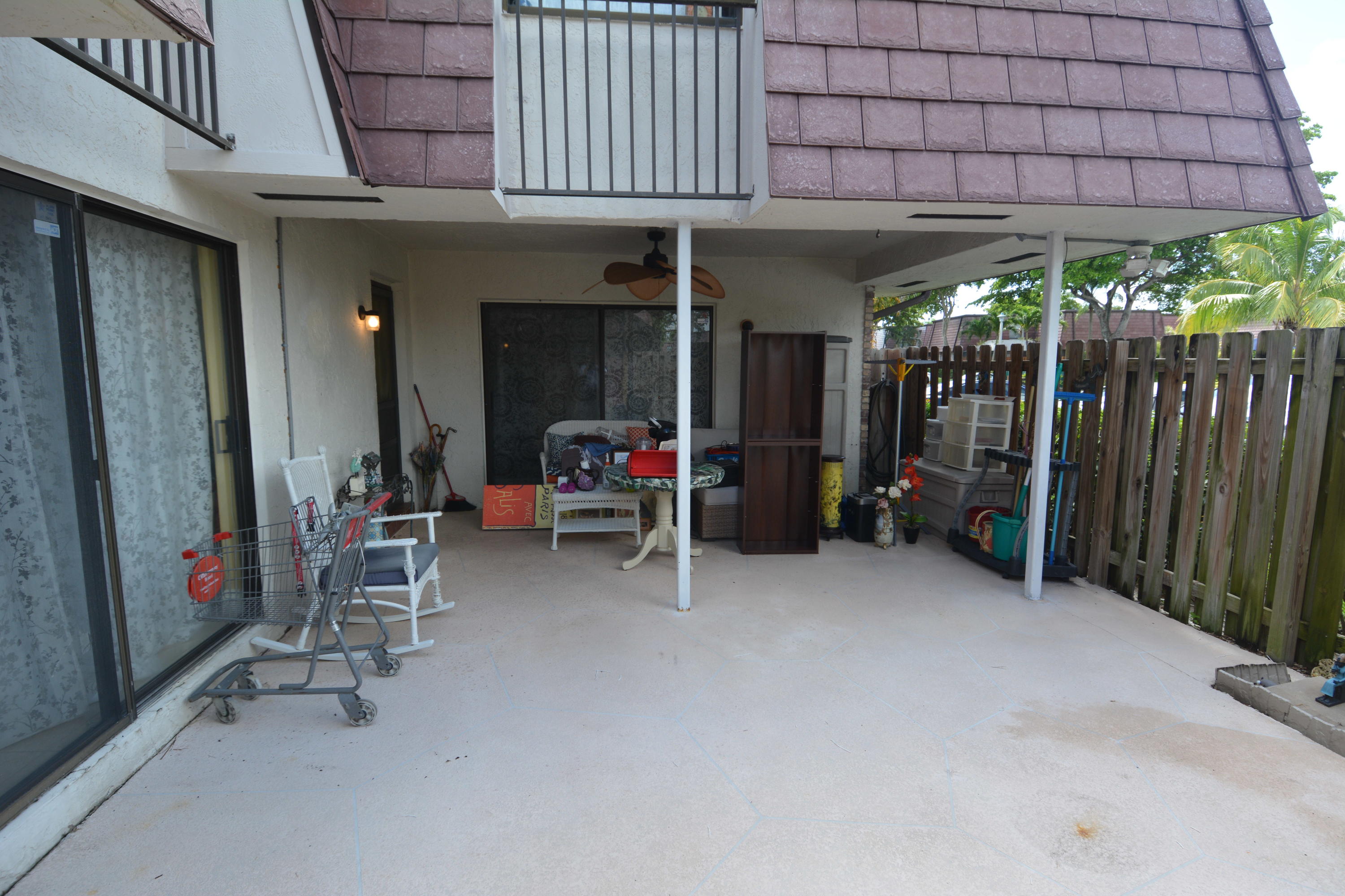 7626 Courtyard Run West Boca Raton, FL 33433 - Photo 2 of 28 Fenced in and covered patio