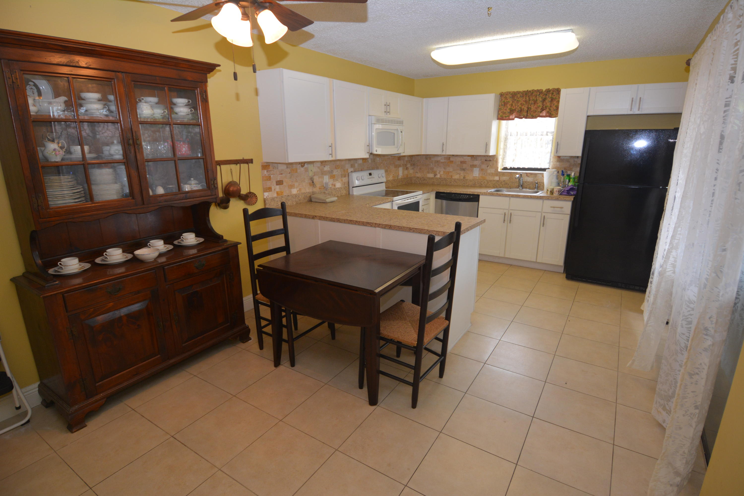 7626 Courtyard Run West Boca Raton, FL 33433 - Photo 5 of 28 Kitchen and dining