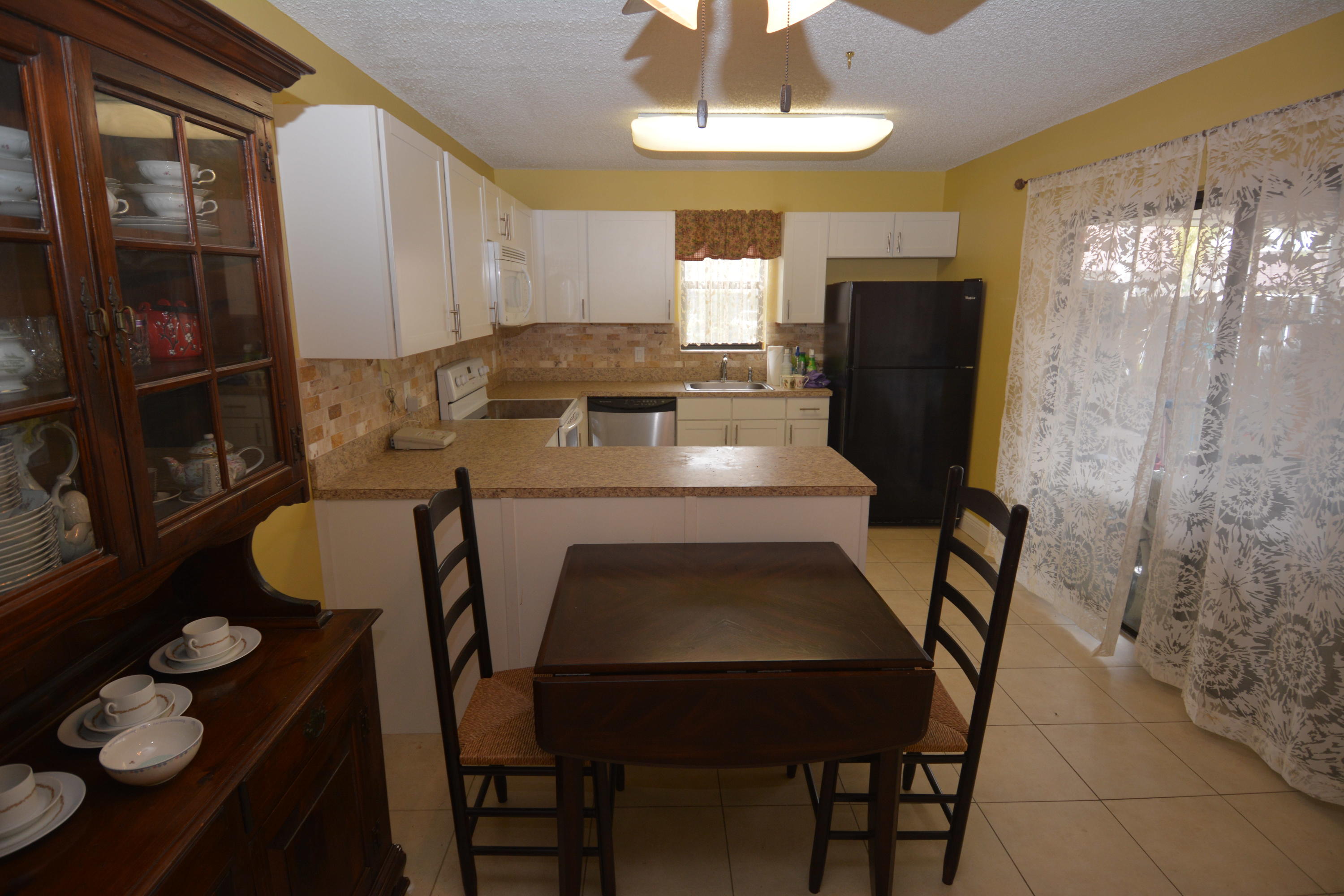 7626 Courtyard Run West Boca Raton, FL 33433 - Photo 7 of 28 Kitchen and Dining