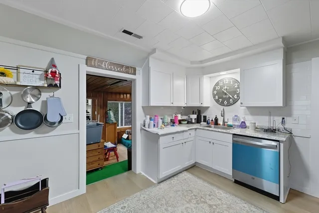 a kitchen with a stove and a microwave