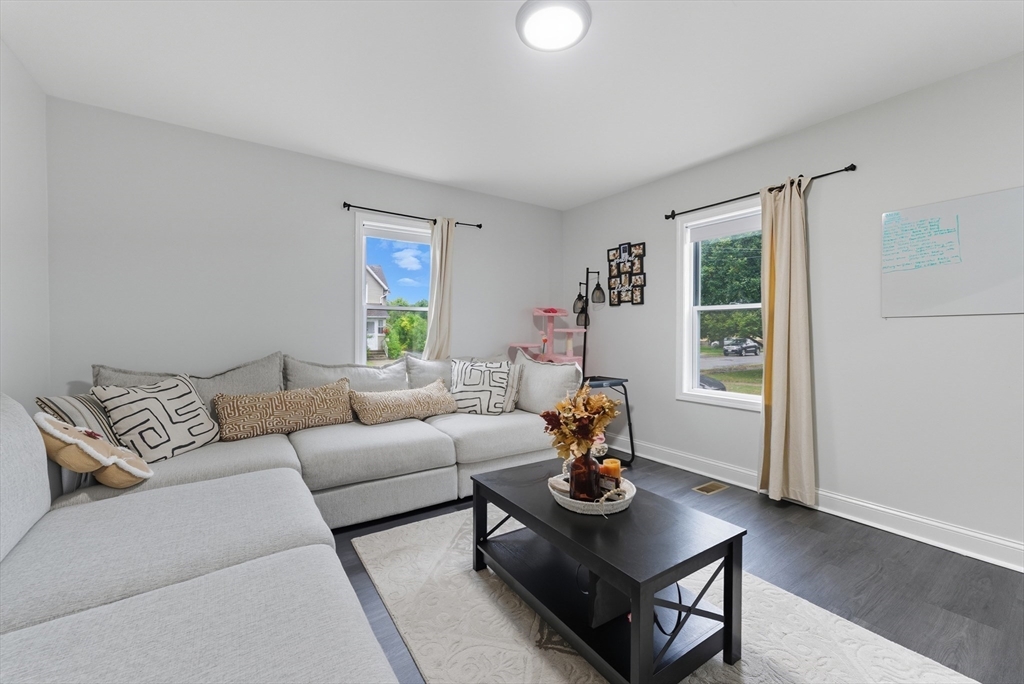 24 Elm Street Ludlow, MA 01056 - Photo 4 of 39 a living room with furniture and window