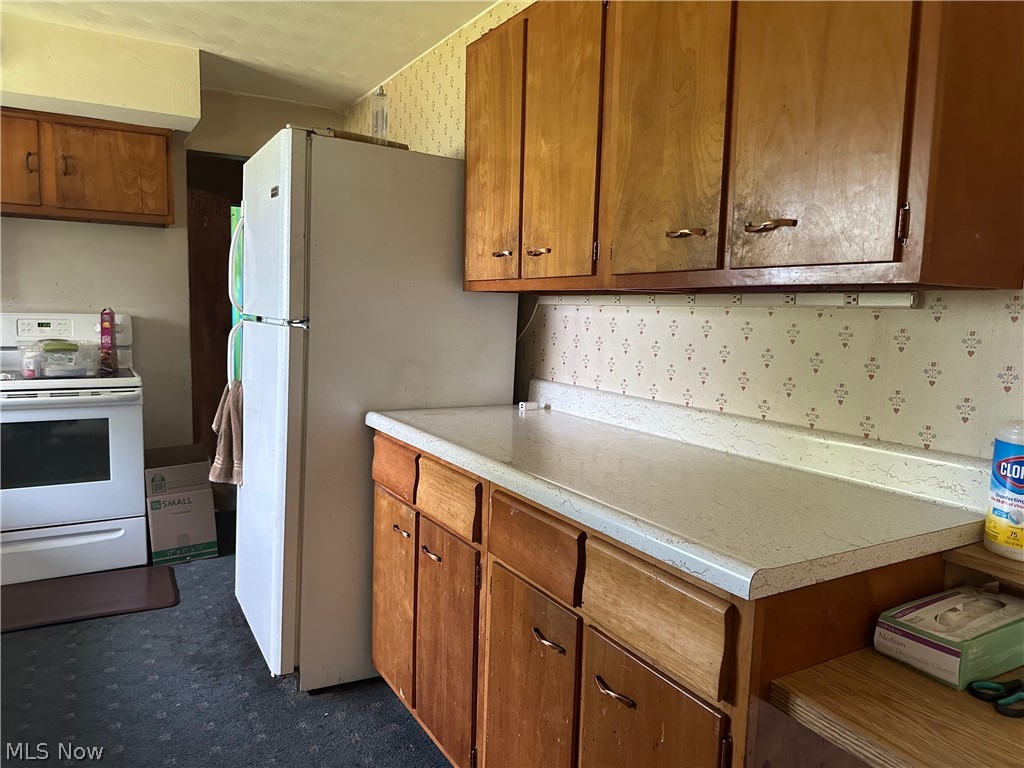2857 McCoy Road Wooster, OH 44691 - Photo 13 of 19 Kitchen featuring white appliances